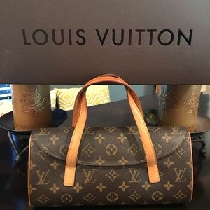 Louis Vuitton SONATINE monogram purse.